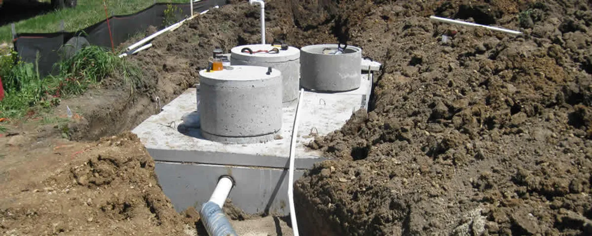 Septic system repair and installation site with tank access ports in Phoenix, AZ